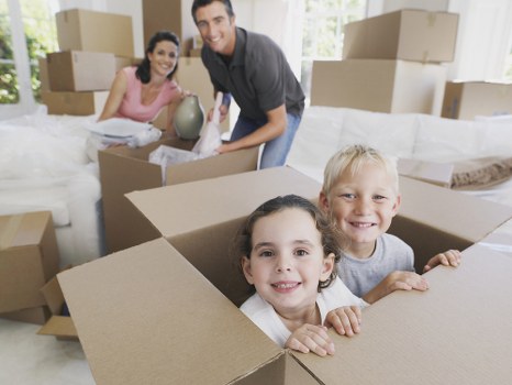 Office relocation planning in Clapham with moving boxes and office furniture