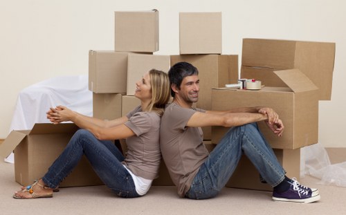 Dismantled office desks and IT equipment prepared for safe relocation