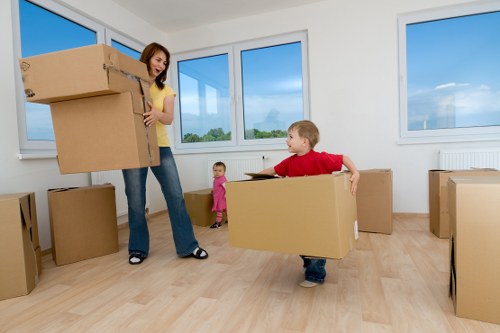 Professional removal team handling furniture during a Clapham move